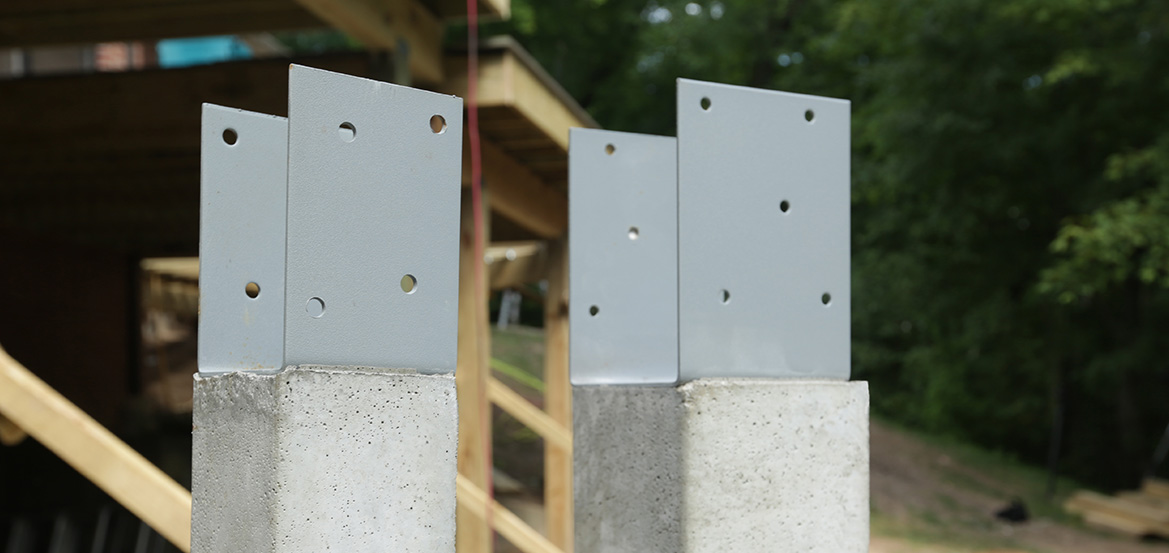 Precast concrete deck post engineered
